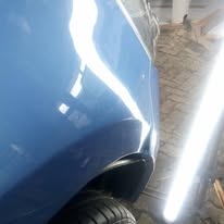 Blue Sedan — Rear Quarter after repair